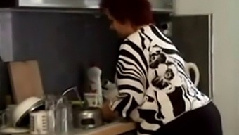 A Curvy Granny Gets Penetrated In The Culinary Room